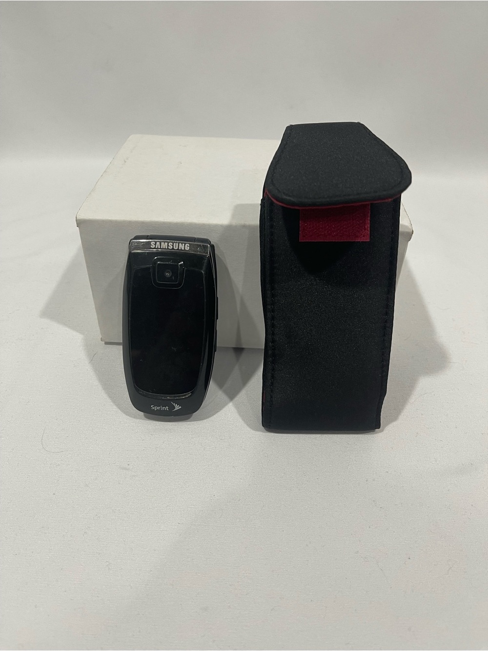 Samsung Black Flip Phone with Black Holster